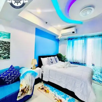 Ocean theme Navy Blue Deluxe Suite with PS4 and Balcony overlooking Manila Bay and Manila Zoo plus near Manila Yacht Club and Star City