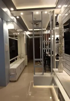 a bathroom with two sinks and a large mirror at LIGHT HOUSE ( MOA STAYCATION) in Manila