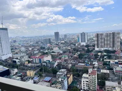 a city view of a city with tall buildings at City and Sea view Staycation at Coast Residences in Manila