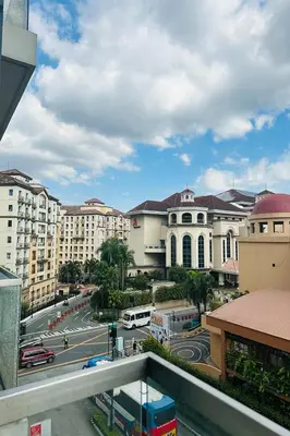 a view from a balcony of a city with a street at Del's Condotel across NAIA Terminal 3 in Manila