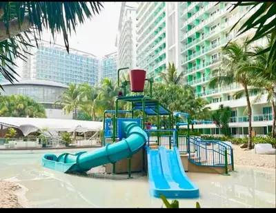 a water slide in a playground in a resort at The Bahama Hammock - Azure PH in Manila