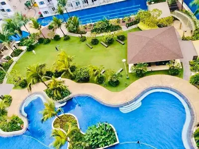 an aerial view of the pool at the resort at SHELL RESIDENCE c12 NEAR AIRPORT SHORWALK TO MALL OF ASIA in Manila
