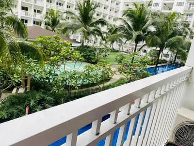 a view from the balcony of the resort at SHORE RESIDENCE D8 NEAR aiRPORT & SHORTWALK TO MALL OF ASIA in Manila