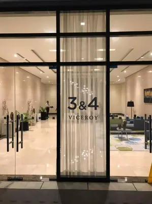 a store front with a window in a lobby at Casa Antonio at Viceroy McKinley Hill in Manila