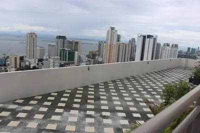 a view of a city from the roof of a building at CONDOMINIUM AT TAFT AVENUE, MALATE, Manila in Manila