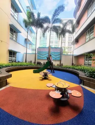 a playground in a building with a slide at House of B&Y at 101 Newport across NAIA T3 in Manila