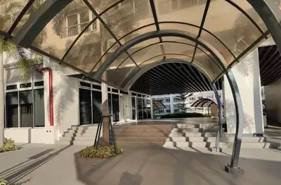 an entrance to a building with an archway at Nathan's Pad @ Grace residences Nr. BGC in Manila
