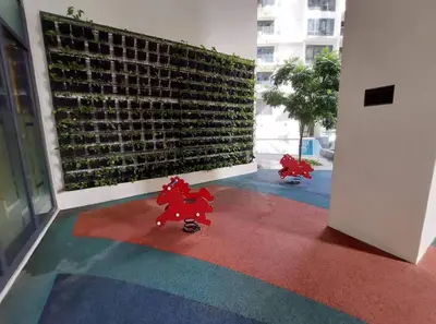 two red horses on a floor in a building at The Florence at McKinley Hill in Manila