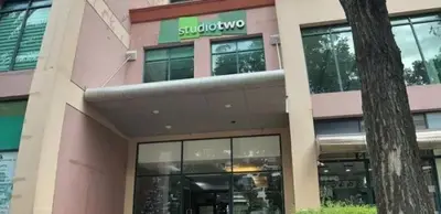 a building with a sign on the side of it at Budget Condotel in Manila