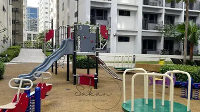 a playground with a slide in a park at Sakan 5-Star Quality Condotel in Manila