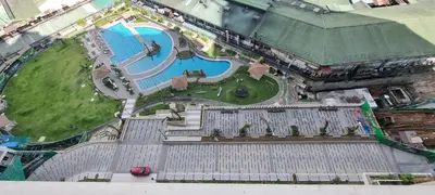 an overhead view of a park with a swimming pool at Apartment in Pasig in Manila
