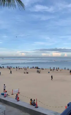 a large group of people on a beach at US Embassy Roxas Blvd, Ermita, Manila 1 Bedroom ComfySuite in Manila