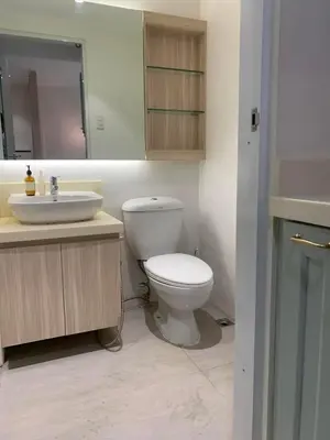 a bathroom with a toilet and a sink at US Embassy Roxas Blvd, Ermita, Manila 1 Bedroom ComfySuite in Manila