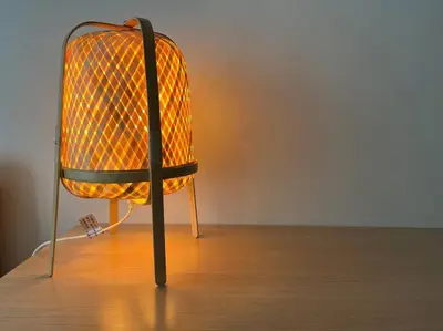 a orange chair sitting on top of a wooden floor at Hygge home with Ayala CBD Makati view! NEW! in Manila