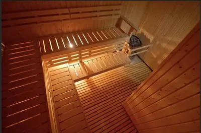 an overhead view of a wooden sauna with a bench at One bedroom Apartment with Netflix at Greenbelt Makati in Manila