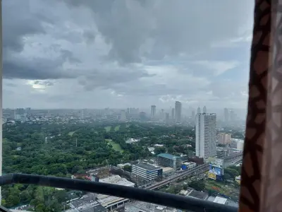 a view of a city from the top of a building at Romantic 1 Bedroom with Pool in Manila