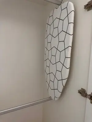 a mirror hanging on a wall in a bathroom at Uptown BGC Luxury 1br Suite with Fast Wifi in Manila
