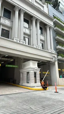 a building with a monument in front of it at Uptown BGC Luxury 1br Suite with Fast Wifi in Manila