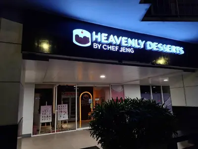 a store front with a sign for a herniands by chief lending at Best staycation at Shell residences in MOA complex in Manila