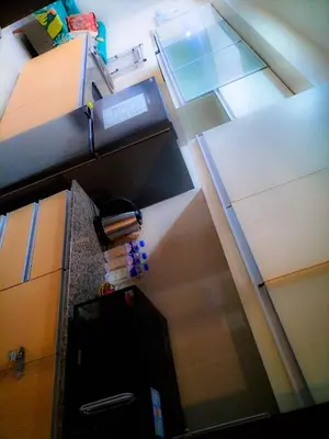 an overhead view of a kitchen with a refrigerator at One Uptown Opposite of grandhyatt hotel manila Taguig city in Manila