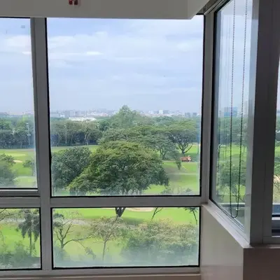Enjoy BGC Sunset and Golf Course View 2 BR Loft with 100mbps Internet Connection