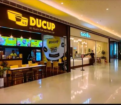 a duyup restaurant in a shopping mall at Air Residences Condominium Deluxe in Manila