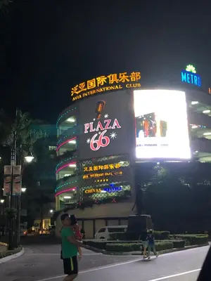 a large building with a sign on it at night at Robles’ Unit at 81 Newport Boulevard in Manila