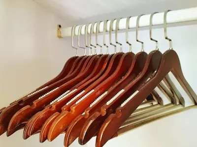 a bunch of knives hanging on a rack at Spring Residences Scandinavian 2 bedrooms with balcony Near NAIA in Manila