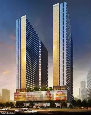 three tall buildings in a city with a car in front at 2BR SMDC Premium Unit: FAME Residences 31st FLOOR in Manila