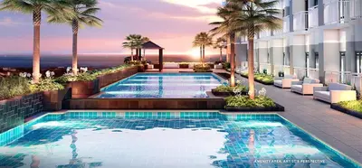 a swimming pool on the side of a building with palm trees at Luxury Sunset Views and Prime Location near CCP MOA with WIFI Parking in Manila