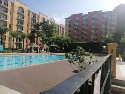 a view of a swimming pool in a building at CHATEAU ELYSEE A13 Near Resto And Sm Mall/Airport in Manila
