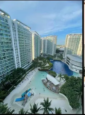 an aerial view of a swimming pool in a resort at Azure Urban Residence A10 Near Airport and SM Bicutan+ Free wifi in Manila