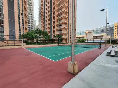 a tennis court in the middle of a city at Morgan Suite BGC Shortwalk3 Venice Mall free pool gym in Manila
