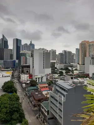 a cityscape of a city with tall buildings at VICTORIA DE MAKATI Two (2) Bedroom Up and Down Condo in Manila