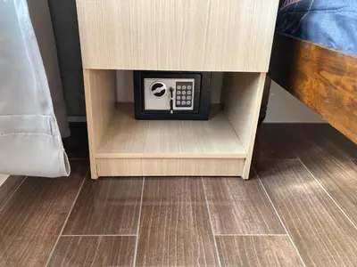 a microwave in a drawer in a cabinet at Makati amazing view Penthouse studio, Air Residence, fast internet in Manila