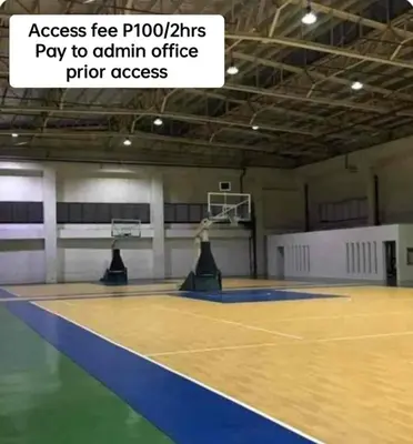 a tennis court with a person playing a game at 821 Field Res Condo by Bambie with 2 wifi in Manila