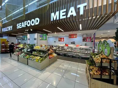 a store with a meat counter in a supermarket at Modern Classic 1 BR Condo Air Residences Makati in Manila