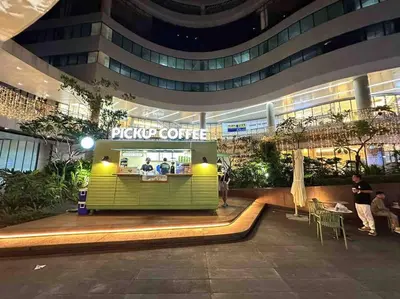 a food court in the middle of a building at Modern Classic 1 BR Condo Air Residences Makati in Manila