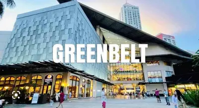 a large building with the words greenebel on it at Sky Staycation KL Greenbelt, Isabel's Makati Rooms in Manila