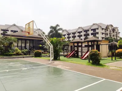 a basketball court in front of a apartment complex at StayHere - Nordic Design 2BR Serviced Apartment in Manila