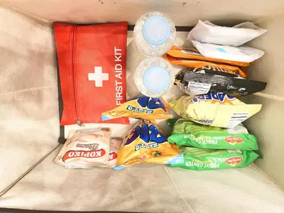 a box filled with chips and other food items at Fully furnished condo in Quezon City in Manila
