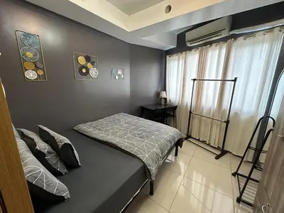 a bedroom with a bed in a room at Kathys crib 32sqm Condo Shell Residences in Manila