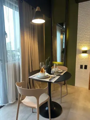 Gallery image of QLED 55 inch TV, 220 Mbps, Coffee Pods, King Bed 3 mins walking distance to LRT 2 station, 10 mins drive to Robinson Magnolia Mall in Manila