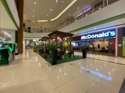 a shopping mall with at San Lorenzo Place in Manila