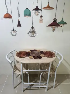 a table with a cake on top of it at Urban Deca Shaw EDSA Mandaluyong in Manila