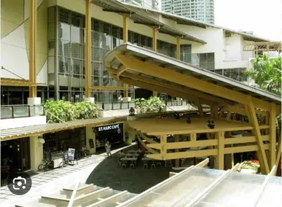 an overhead view of a large building with tables and chairs at Lux Skyline KL Greenbelt, Isabel's Makati Rooms in Manila