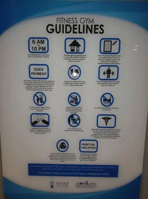 a sign for a fitness gym guidelines on a wall at Avant in BGC - Spacious 1 Bedroom with Amazing View in Manila