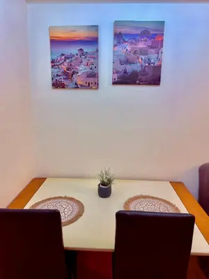 a table with a potted plant on top of it at Cozy Condo in Ermita Manila near St Lukes Medical Center and US Embassy in Manila