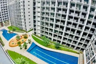 Gallery image of MALL Of ASIA-P00L Fr0nt- NEW 1 BR Condo with Balc0ny at Sh0re2 in Manila