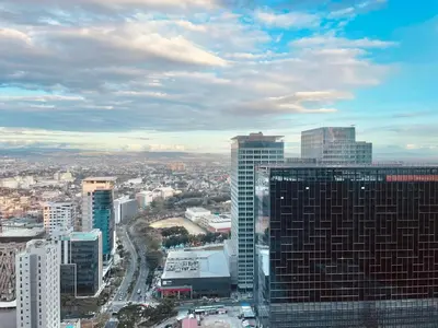 an aerial view of a city with tall buildings at Uptown Parksuites BGC in Manila